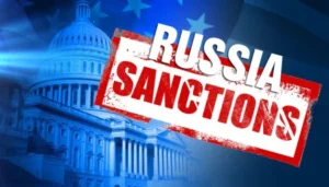 Капітолій США з червоним штампом Russia Sanctions