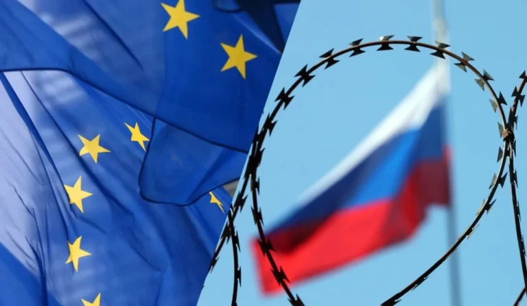 Флаги ЕС и РФ разделены колючей проволокой из-за санкций