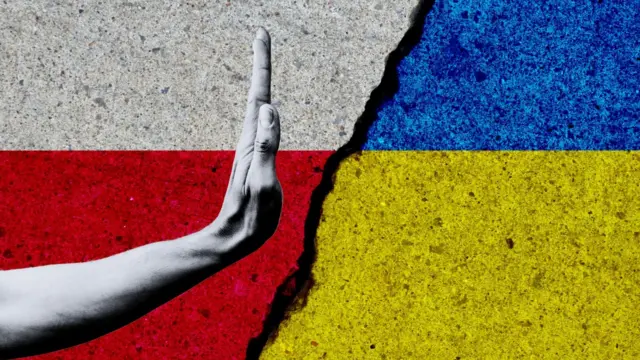 Рука зупиняє розбрат між прапорами Польщі та України