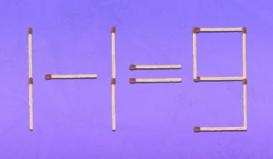 Сірники на фіолетовому тлі складають рівність один мінус один дорівнює дев’ять